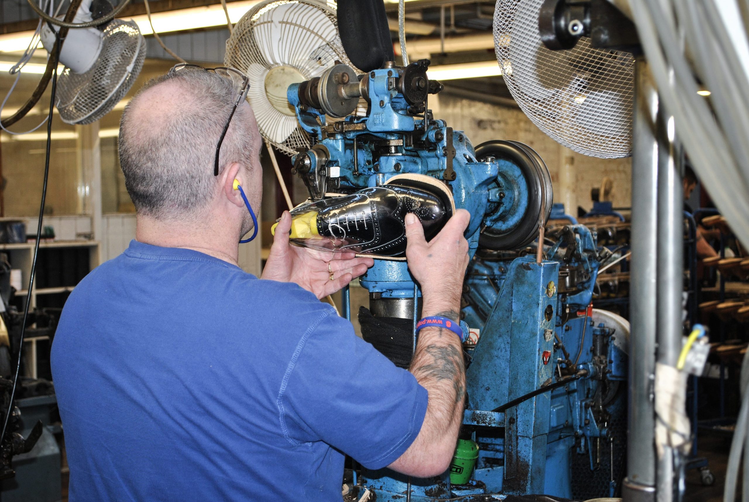 What does Goodyear welted mean? A Cheaney Shoes craftsman adding a Goodyear welt in the Cheaney shoes factory.