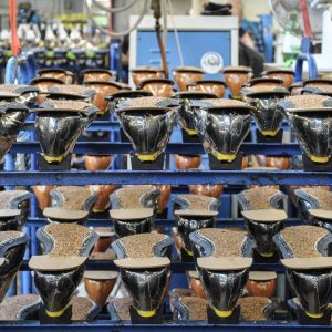 What’s a Goodyear Welt? Image of rows of Goodyear welted shoes going through the Goodyear welting process in the Cheaney Shoes factory.