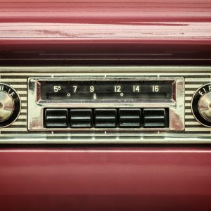 A Brief Driving Shoe History - red retro car radio